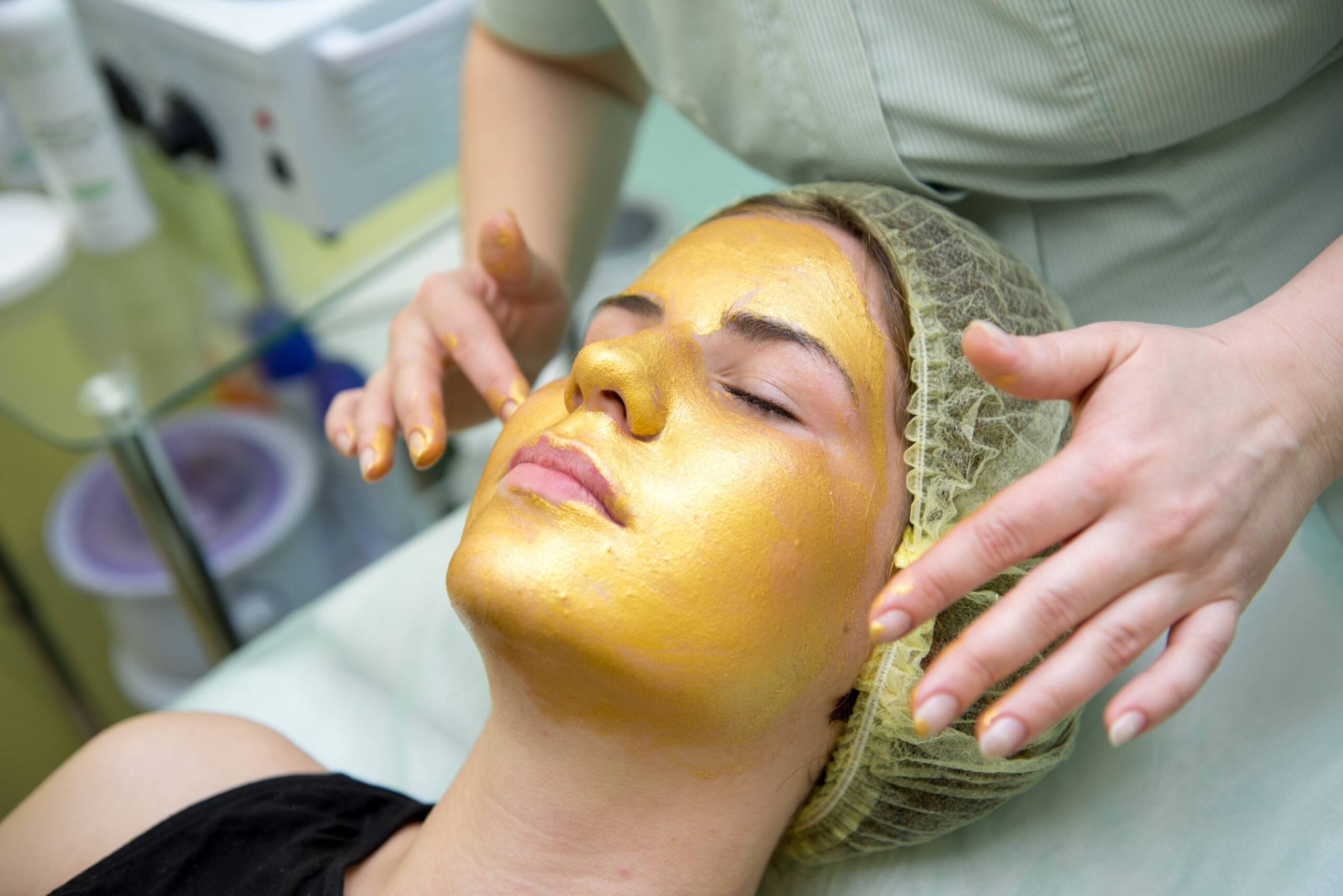 Gold facial mask at the spa salon